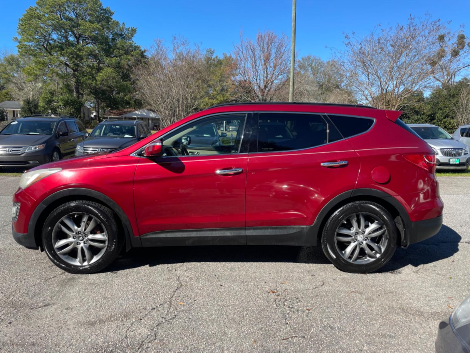 2013 RED HYUNDAI SANTA FE SPORT 2.0T (5XYZU3LA3DG) with an 2.0L engine, Automatic transmission, located at 5103 Dorchester Rd., Charleston, SC, 29418-5607, (843) 767-1122, 36.245171, -115.228050 - Leather, CD/AUX/Sat/Bluetooth, Dual Climate, Power Everything (windows, locks, seats, mirrors), Heated Seats, Rear Heated Seats, Push Button Start, Keyless Entry, Alloy Wheels. Local Trade-in!! Located at New Life Auto Sales! 2023 WINNER for Post & Courier's Charleston's Choice Pre-owned Car Dealer - Photo #3